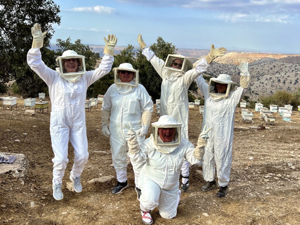 Suited up and experiencing beekeeping in Umm Qais