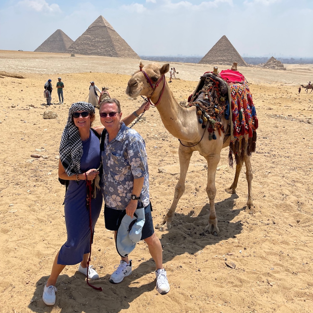 The author with her husband at the Pyramids of Cairo, Egypt