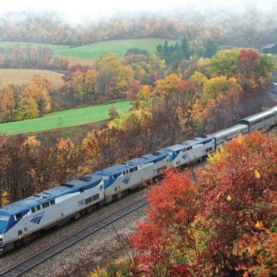 Amtrak Capitol Limited driving through gorgeous fall foliage